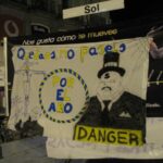 Cartel en boca metro Sol