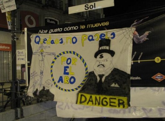 Cartel en boca metro Sol